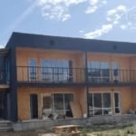 Проект дома «К-279ВВ» из СИП-панелей, 279 м² — двухэтажный дом на этапе строительства с балконами | HotWell.KZ