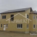 Проект дома «К-201» из СИП-панелей, 201 м² — двухэтажный дом с коричневой крышей и установленными окнами | HotWell.KZ