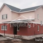 Проект дома «А-214» из СИП-панелей, 214 м² — двухэтажный дом с розовой штукатуркой и серой крышей | HotWell.KZ