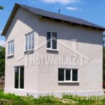 Проект дома «Б-119ГГ» из СИП-панелей, 119 м² — двухэтажный дом со светлой штукатуркой и тёмной крышей | HotWell.KZ