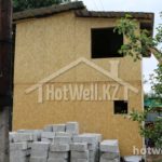 Проект дома «Е-60» из СИП-панелей, 60 м² — двухэтажный дом из ОСБ-плит на стройплощадке | HotWell.KZ