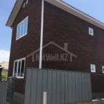 Проект дома «Ш-90» из СИП-панелей, 90 м² — двухэтажный дом с коричневым кирпичным фасадом | HotWell.KZ