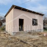Проект дома «К-34» из СИП-панелей, 34 м² — одноэтажный дом с розовой штукатуркой и односкатной крышей | HotWell.KZ