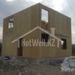 Проект дома «А-100ЖЖ» из СИП-панелей, 100 м² — двухэтажный дом из СИП-панелей без крыши на этапе строительства | HotWell.KZ