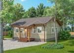 Проект дома «Д-66» из СИП-панелей, 66 м² — одноэтажный дом с зелёной штукатуркой, деревянным крыльцом и каменным цоколем | HotWell.KZ
