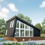 Проект дома «К-93ВВ» из СИП-панелей, 93 м² — современный дом с тёмной обшивкой, односкатной крышей и панорамным остеклением | HotWell.KZ