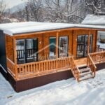 Проект дома «C-61» из СИП-панелей, 61 м² — одноэтажный модульный дом с деревянным фасадом и террасой зимой | HotWell.KZ