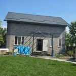 Проект дома «Ф-160» из СИП-панелей, 160 м² — двухэтажный дом с серым кирпичным фасадом | HotWell.KZ