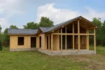 Баня «Р-190Б», 190 м², 1 этаж, в черновой отделке: коробка из СИП-панелей OSB-3, двускатная кровля из металлочерепицы, проёмы без окон и дверей