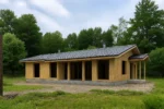 Дом «А-150Б», 150 м², 1 этаж, в черновой отделке: коробка из СИП-панелей OSB-3, двускатная кровля из металлочерепицы, проёмы без окон и дверей