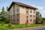Проект дома «Б-655» из СИП-панелей, 655 м² — четырехэтажный дом с бежевым и коричневым фасадом и коричневой крышей | HotWell.KZ
