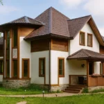 Проект дома «Д-185» из СИП-панелей, 185 м² — двухэтажный дом с белым фасадом, коричневой крышей и террасой | HotWell.KZ