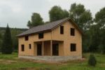 Дом «К-150В», 150 м², 1.5 этажа, в черновой отделке: коробка из СИП-панелей OSB-3, двускатная кровля из металлочерепицы, проёмы без окон и дверей, в проёмах видны сосновые балки перекрытия