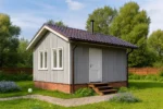 Проект дома «К-25» из СИП-панелей, 25 м² — одноэтажный дом с серым фасадом, коричневой крышей и крыльцом | HotWell.KZ