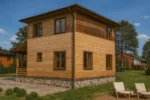 Проект дома «Н-84» из СИП-панелей, 84 м² — двухэтажный дом с деревянным фасадом и крытой террасой | HotWell.KZ