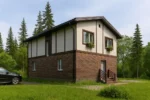 Проект дома «О-160» из СИП-панелей, 160 м² — двухэтажный дом с кирпичным фасадом и двускатной крышей | HotWell.KZ