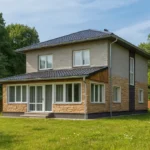 Проект дома «С-180» из СИП-панелей, 180 м² — двухэтажный дом с комбинированным фасадом, черной крышей и террасой | HotWell.KZ