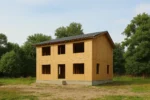 Дом «С-198Б», 198 м², 2 этажа, в черновой отделке: коробка из СИП-панелей OSB-3, двускатная кровля из металлочерепицы, проёмы без окон и дверей, в проёмах видны сосновые балки перекрытия