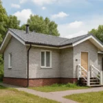 Проект дома «С-49» из СИП-панелей, 49 м² — одноэтажный дом с серым фасадом, серой крышей и крыльцом | HotWell.KZ