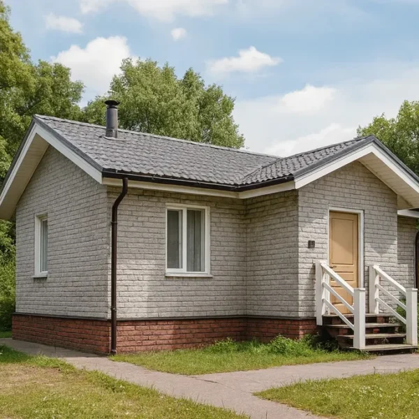 Проект дома «С-49» из СИП-панелей, 49 м² — одноэтажный дом с серым фасадом, серой крышей и крыльцом | HotWell.KZ