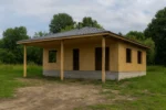 Дом «С-81Б», 81 м², 1 этаж, в черновой отделке: коробка из СИП-панелей OSB-3, вальмовая кровля из металлочерепицы, проёмы без окон и дверей