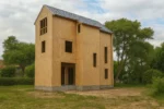 Дом «В-196», 196 м², 2.5 и более, в черновой отделке: коробка из СИП-панелей OSB-3, двускатная кровля из металлочерепицы, проёмы без окон и дверей, в проёмах видны сосновые балки перекрытия
