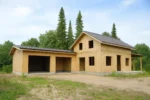 Дом «А-60», 60 м², 1 этаж, в черновой отделке: коробка из СИП-панелей OSB-3, двускатная кровля из металлочерепицы, проёмы без окон и дверей